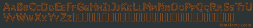 CandyKisses-fontti – ruskeat fontit mustalla taustalla
