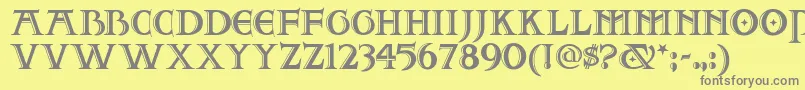 Twofjn-fontti – harmaat kirjasimet keltaisella taustalla