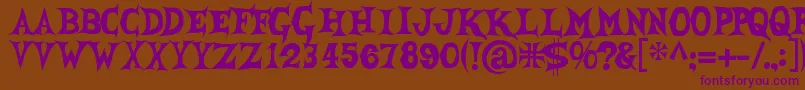 Shecreature Font – Purple Fonts on Brown Background