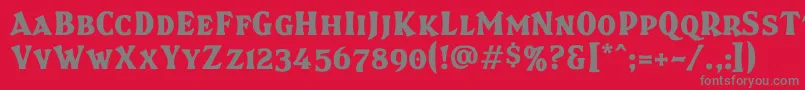 フォントBrasspsc – 赤い背景に灰色の文字