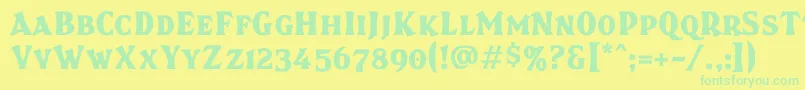 フォントBrasspsc – 黄色い背景に緑の文字
