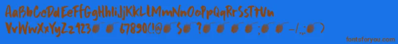 DkFramboisier-Schriftart – Braune Schriften auf blauem Hintergrund