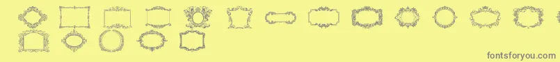 フォントVintageFrames – 黄色の背景に灰色の文字