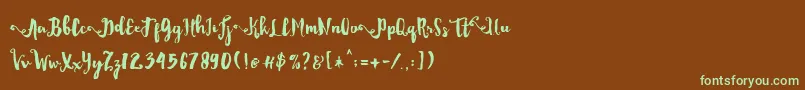 フォントDality – 緑色の文字が茶色の背景にあります。