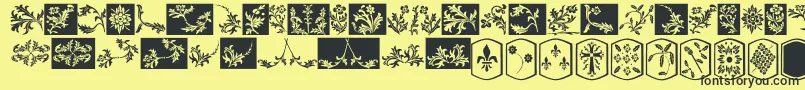 OldEnglishDingbats-fontti – mustat fontit keltaisella taustalla