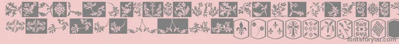 OldEnglishDingbats-Schriftart – Graue Schriften auf rosa Hintergrund