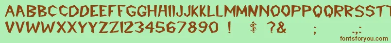 CavemannBold Font – Brown Fonts on Green Background