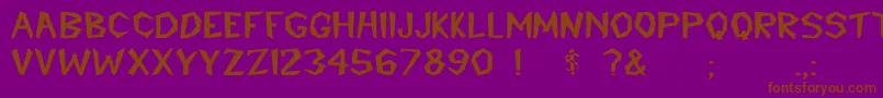 CavemannBold Font – Brown Fonts on Purple Background