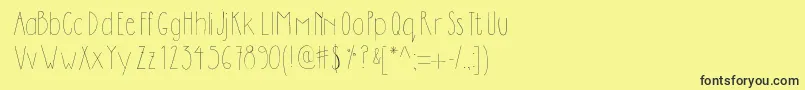 Dilemhandwritten-fontti – mustat fontit keltaisella taustalla