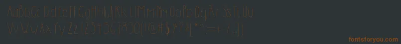 Шрифт Dilemhandwritten – коричневые шрифты на чёрном фоне