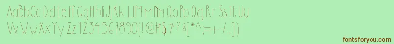 Dilemhandwritten-fontti – ruskeat fontit vihreällä taustalla