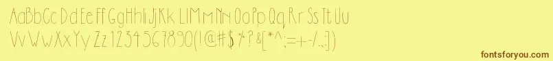 Dilemhandwritten-fontti – ruskeat fontit keltaisella taustalla