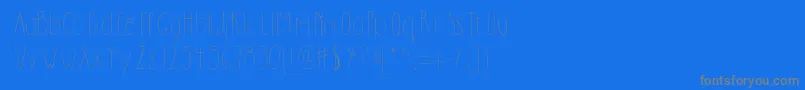 フォントDilemhandwritten – 青い背景に灰色の文字