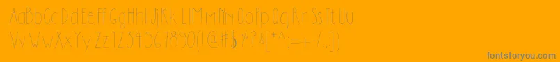 フォントDilemhandwritten – オレンジの背景に灰色の文字