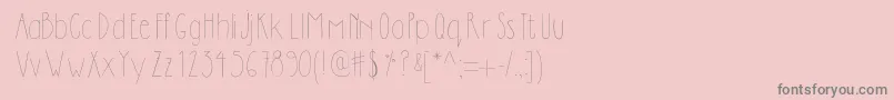 フォントDilemhandwritten – ピンクの背景に灰色の文字