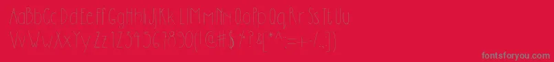 フォントDilemhandwritten – 赤い背景に灰色の文字