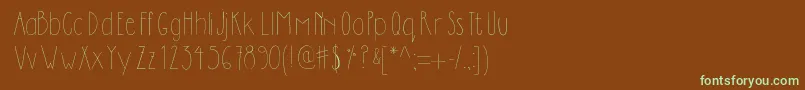 Dilemhandwritten-fontti – vihreät fontit ruskealla taustalla