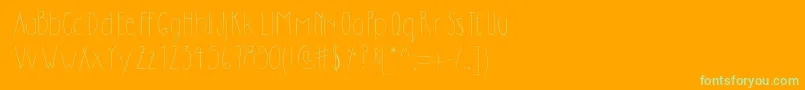 フォントDilemhandwritten – オレンジの背景に緑のフォント