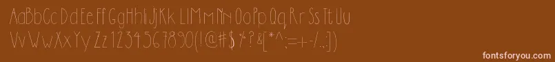 Dilemhandwritten-fontti – vaaleanpunaiset fontit ruskealla taustalla