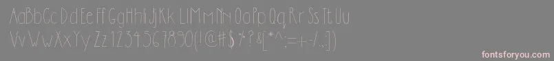 フォントDilemhandwritten – 灰色の背景にピンクのフォント