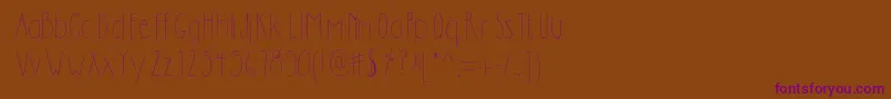 Dilemhandwritten-fontti – violetit fontit ruskealla taustalla