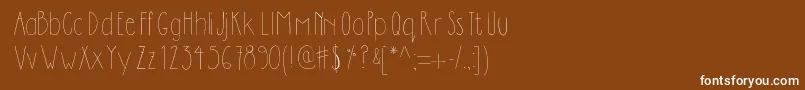 フォントDilemhandwritten – 茶色の背景に白い文字