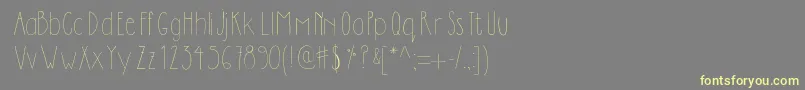 Dilemhandwritten-fontti – keltaiset fontit harmaalla taustalla