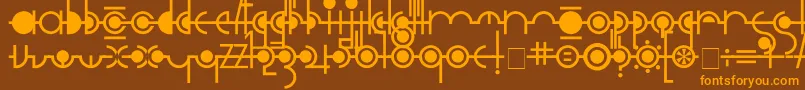 フォントCropograph – オレンジ色の文字が茶色の背景にあります。
