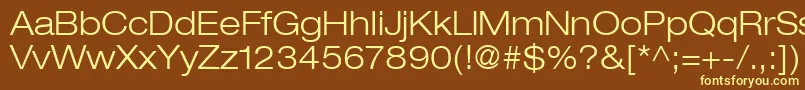 HelveticaLt43LightExtended Font – Yellow Fonts on Brown Background