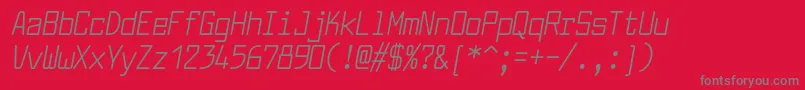 Fonte LarabiefontcdItalic – fontes cinzas em um fundo vermelho