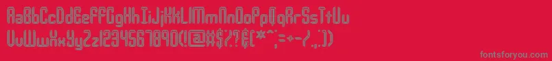 フォントUrcompi – 赤い背景に灰色の文字