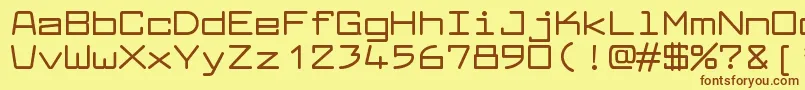 フォントLarabiefontexBold – 茶色の文字が黄色の背景にあります。