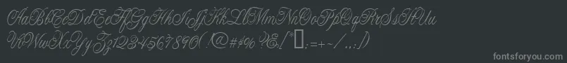 CacLaskoCondensed-fontti – harmaat kirjasimet mustalla taustalla