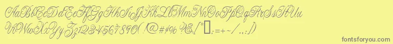 CacLaskoCondensed Font – Gray Fonts on Yellow Background