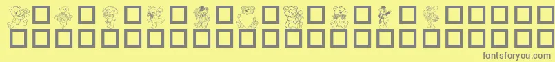 フォントTeddydings2Dl – 黄色の背景に灰色の文字