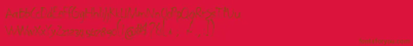 Czcionka Embrush – brązowe czcionki na czerwonym tle