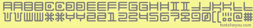 フォントAlienDouble – 黄色の背景に灰色の文字