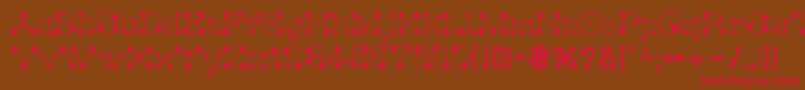 MatchstickSlim-Schriftart – Rote Schriften auf braunem Hintergrund