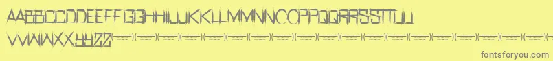 Fonte RealhorrorRegular – fontes cinzas em um fundo amarelo