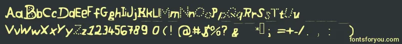 フォントCoolyFont – 黒い背景に黄色の文字