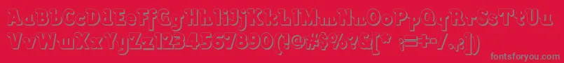 Lackawannaweednf-Schriftart – Graue Schriften auf rotem Hintergrund