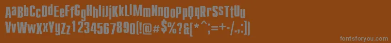 フォントCompactdancec – 茶色の背景に灰色の文字