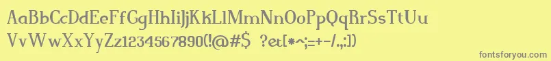 Magnusjockey-fontti – harmaat kirjasimet keltaisella taustalla