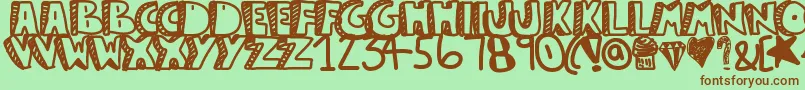フォントGuestservice – 緑の背景に茶色のフォント