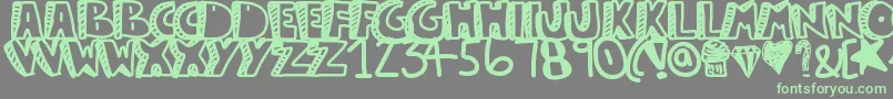 フォントGuestservice – 灰色の背景に緑のフォント
