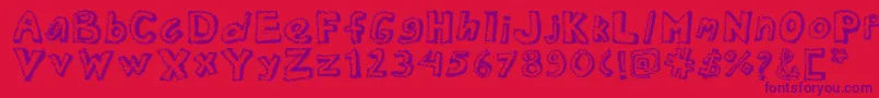 フォントDottednewspaper – 赤い背景に紫のフォント