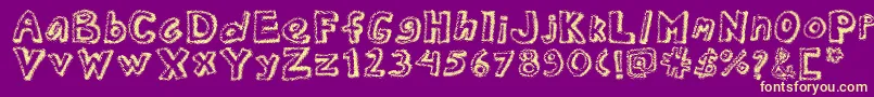 Dottednewspaper-fontti – keltaiset fontit violetilla taustalla