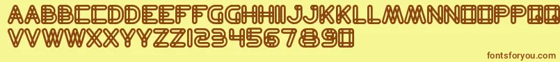 フォントBambooShoot – 茶色の文字が黄色の背景にあります。