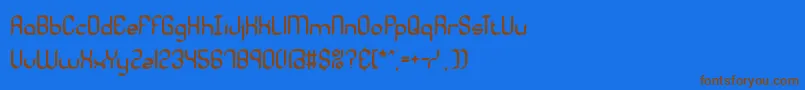 フォントQuadrcal – 茶色の文字が青い背景にあります。