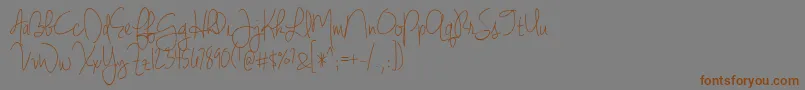 BmdJenniferLynne-Schriftart – Braune Schriften auf grauem Hintergrund